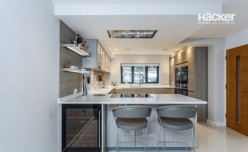 Contemporary chic kitchen design in Arundel with sleek cabinetry and modern finishes