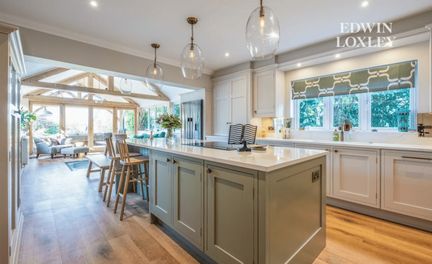 Oak-beamed orangery dining area with built-in larder cupboard, Refined Harmony kitchen in Chichester