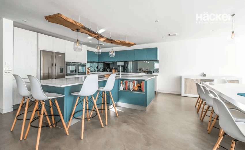 Seaside kitchen entertaining space in Shoreham-by-Sea with dark bar unit, wine cooler and ceiling feature lighting