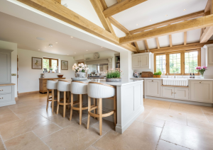Bespoke shaker kitchen with island and butler sink.