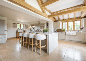 Bespoke shaker kitchen with island and butler sink.