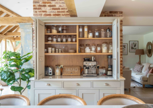 Bespoke shaker kitchen with breakfast cupboard doors open